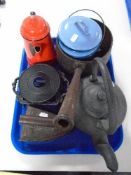 A tray of antique cast iron kettle and trivet, antique flat iron, enamel containers,