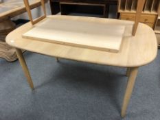 A Mobel Furniture Haslev extending table with leaf, 188 cm.