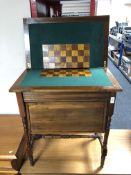 An Edwardian mahogany turnover top games table.