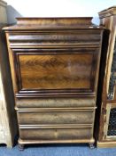 A 19th century continental mahogany secretaire chest, height 166.5 cm, width 107 cm, depth 52 cm.