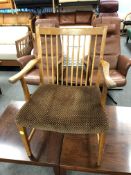 A mid century Danish spindle backed armchair