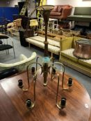 A vintage continental brass six way light fitting