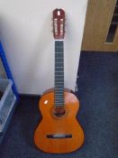 An acoustic Spanish guitar