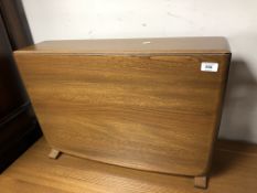 An Ercol elm and beech Sutherland table.