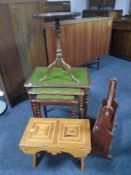 A nest of three tables with leather inset panels together with a further wine table,