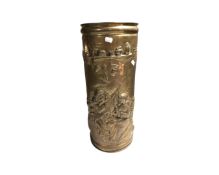 A brass embossed stick pot