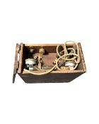 A British military portable trench telephone with hand set in box