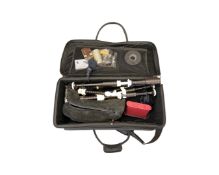 A set of McCallum AB3 Deluxe bagpipes, of combed and beaded African blackwood, faux ivory mounts,