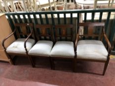 A set of four antique continental inlaid mahogany chairs