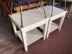 A pair of contemporary white two tier lamp tables,