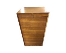 A mid century teak shutter door music cabinet,