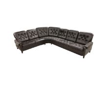 A 1970's Danish brown buttoned leather corner settee