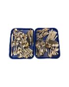 A collection of silver-plate and stainless steel flatware.