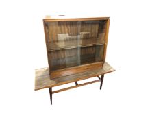 A mid century teak sliding glass door bookcase, width 91 cm,