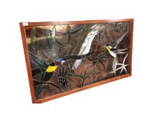 A stained glass window depicting three birds, in a heavy wooden frame, 74cm by 124cm.