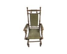 A 20th century oak rocking chair