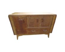 A mid century G-Plan E Gomme light oak sideboard width 123 cm
