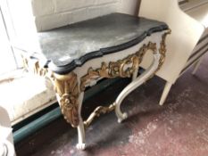 An ornate painted hall table with wooden faux marble top,