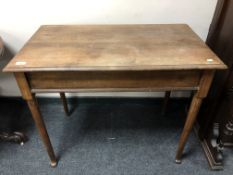 A 19th century mahogany table,