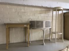 A painted two tier plant stand together with a two tier plant trough with liner on claw and ball