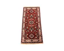 A Persian design rug,