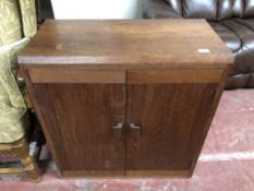 A contemporary double door cabinet,