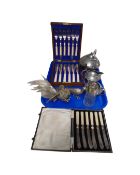 A tray of three piece plated tea service, metal bird ornaments,
