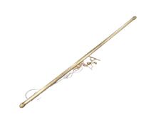 An antique brass curtain pole with brackets
