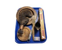 A tray containing wooden tourist pieces, silver plated meat skewer, a Big Ben Cogétama cigar in box.