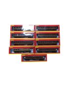 Eight Hornby BR teak 3rd class coaches together with an LNER Thompson suburban brake 3rd class