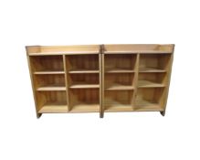 A pair of pine open bookshelves,