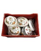 A storage crate containing a quantity of Royal Worcester Evesham ware, oven dishes and plates etc.