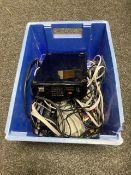 An Excelon 3D tracer in box together with a Nintendo Wii with leads.