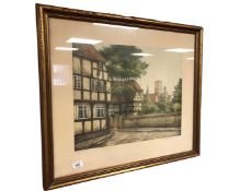 A hand coloured print depicting a church, 49cm by 39cm.