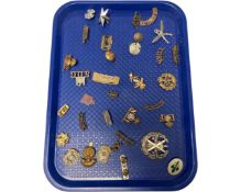 A collection of military badges, Northumberland, York, Green Howards etc.