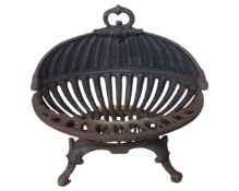 A cast iron fire grate.