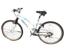 An Apollo lady's mountain bike with front suspension.