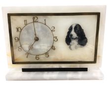 An Art Deco alabaster mantel clock,