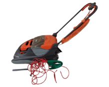 A Flymo electric lawnmower together with a Qualcast hedgemaster