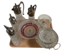 A tray containing crystal and glass decanters etc.