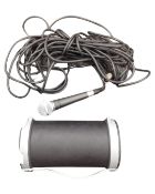 An Accelerate portable speaker with Shure SM58 microphone and lead.