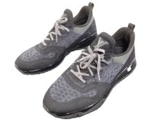 A pair of Louis Vuitton two tone black trainers.