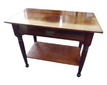 A mahogany two tier side table.