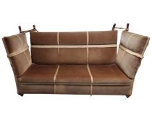 An antique style drop end settee.