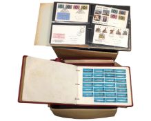 Two boxes containing files of First Day Covers and stamps.