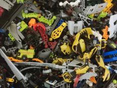 A box containing a large quantity of plastic figures and vehicles, connection figures.