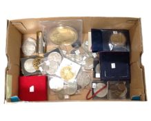 A collection of coins including commemorative issues, WW II defence medal, coin holder,