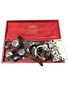 A small box containing gent's wristwatches.