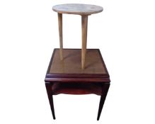 An Art Deco two tier occasional table together with a further circular lamp table