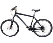 A Specialised Rockhopper front suspension mountain bike.